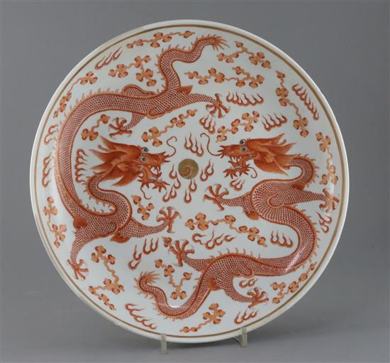A Chinese rouge de fer and gilt dragon dish, Guangxu six character mark and of the period (1875-1908), Diam.34cm, restoration to rim,